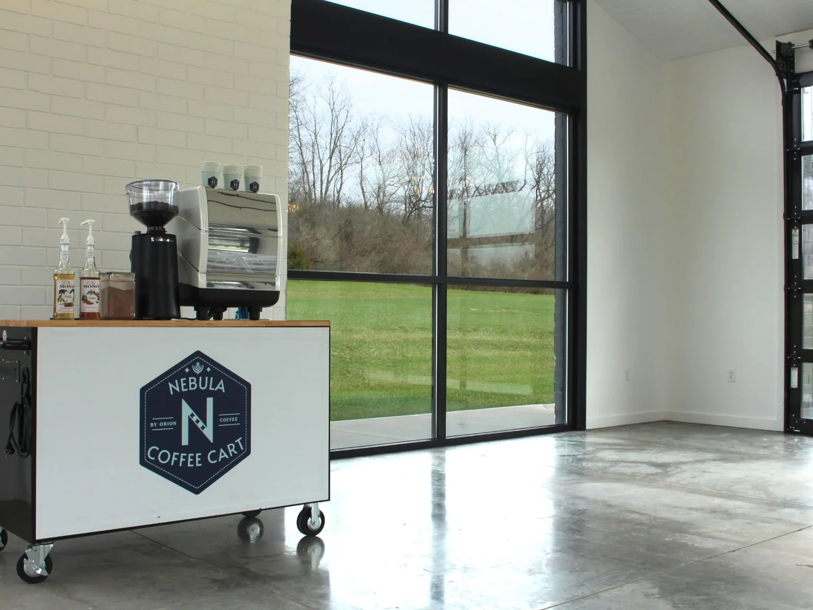 Professional mobile coffee cart service setup at corporate event venue