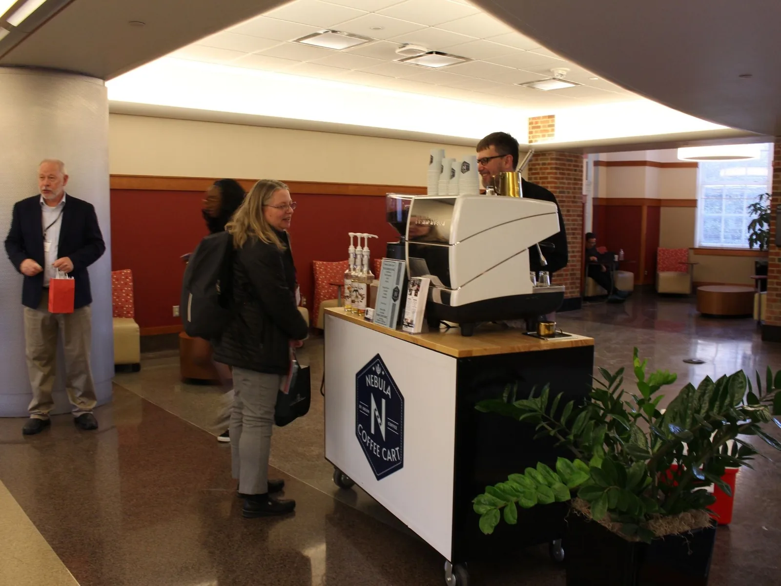 Rented Nebula coffee cart with a barista serving guests at an Ohio event